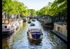 Head through the Narrow Canals of the Jordaan